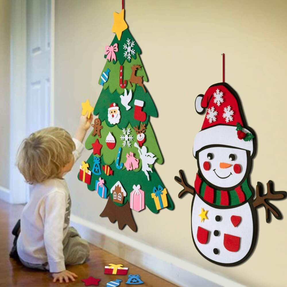 A toddler playing with a Montessori Christmas Tree, trying to put on a star ornament.